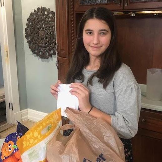 Handed fruit to strangers to spread kindness